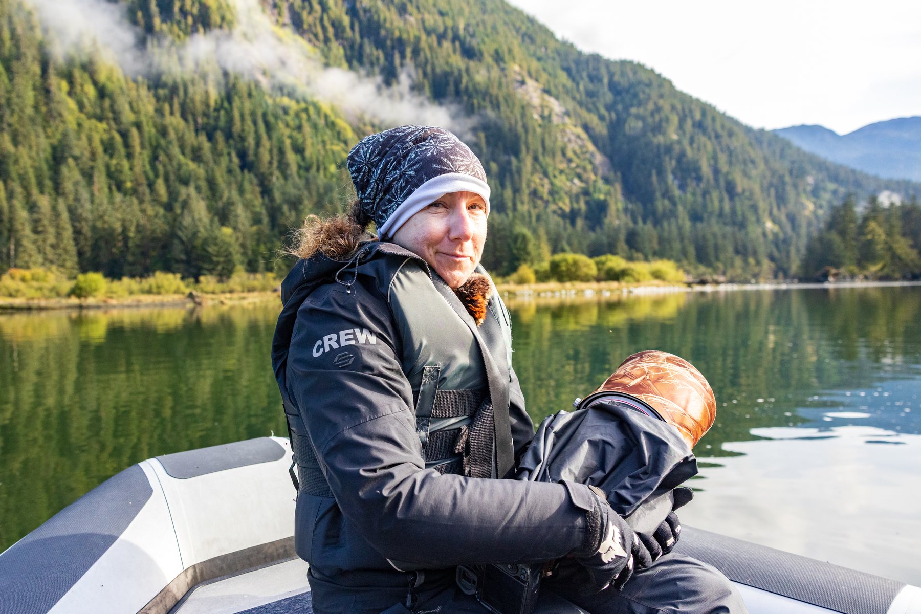 Isabelle Gecils on the water, photographing in the field